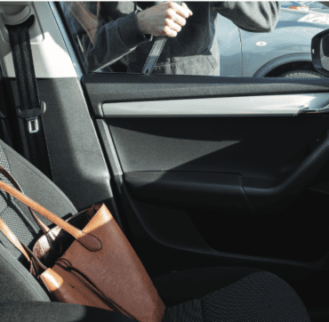 Person breaking into a car