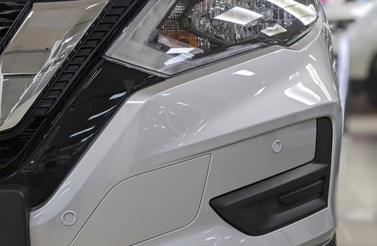 Front sensors installation white car